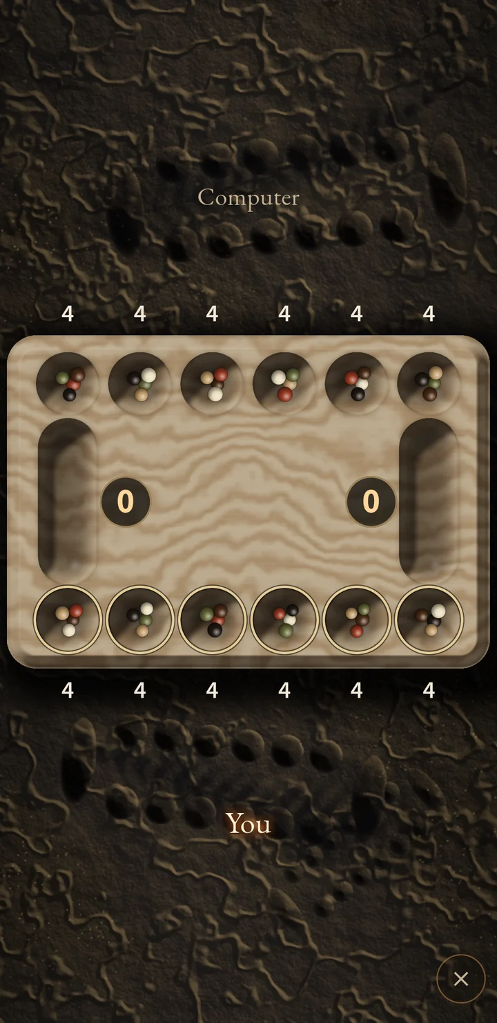 Mancala in Bygone: a carved board on worn stone